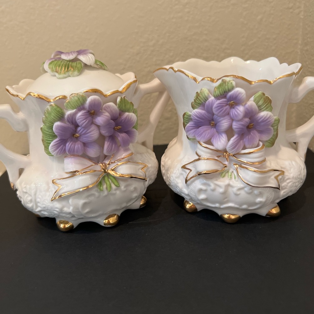 Vintage Porcelain of sugar and creamer raised purples violets